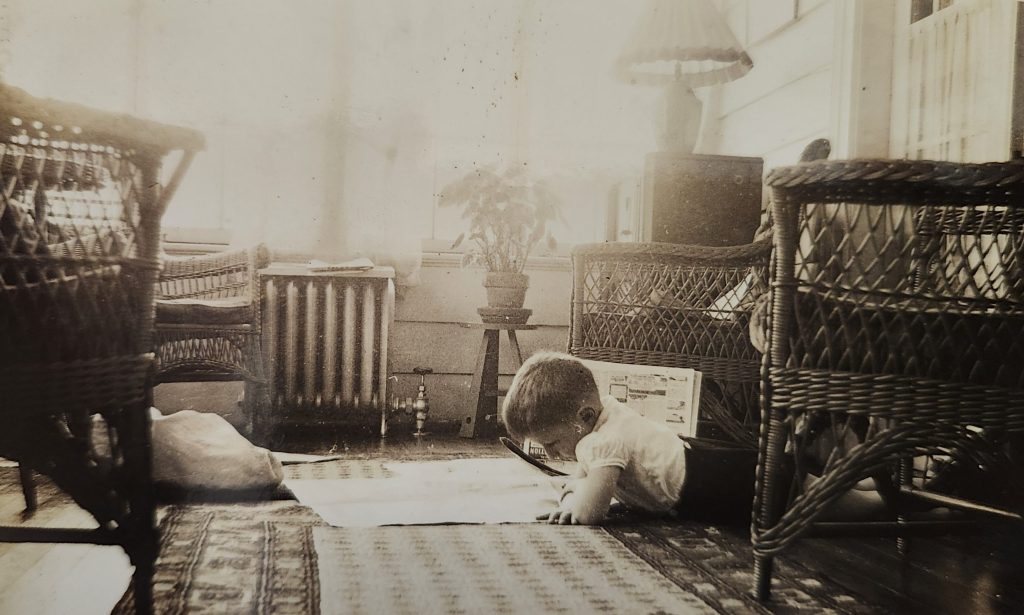 Child reading on the floor